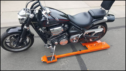Holy Roller adjustable low-profile motorcycle dolly manufactured and marketed by Fusion Fabrication, 6545 E. County Road #14, Loveland Colorado 80537, to order call 970-690-6856